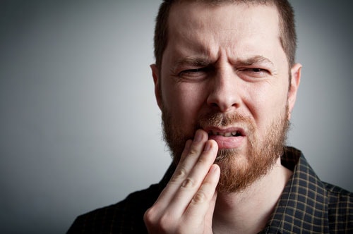 Could You Be Suffering From A TMJ Disorder Or Teeth Grinding? [QUIZ]